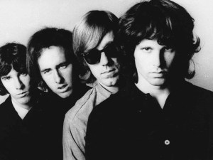 Even when magazines and newspapers ran obits for Manzarek (second from right), he's in Morrison's shadow