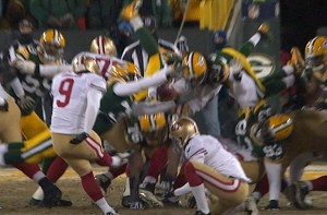 The reason he got so close to blocking the kick is that he was offsides. Broadcast team Joe Buck and Troy Aikman failed to notice this, because they are morons